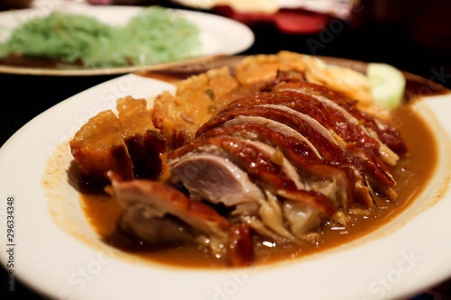 grilled duck and grilled pork in gravy sauce