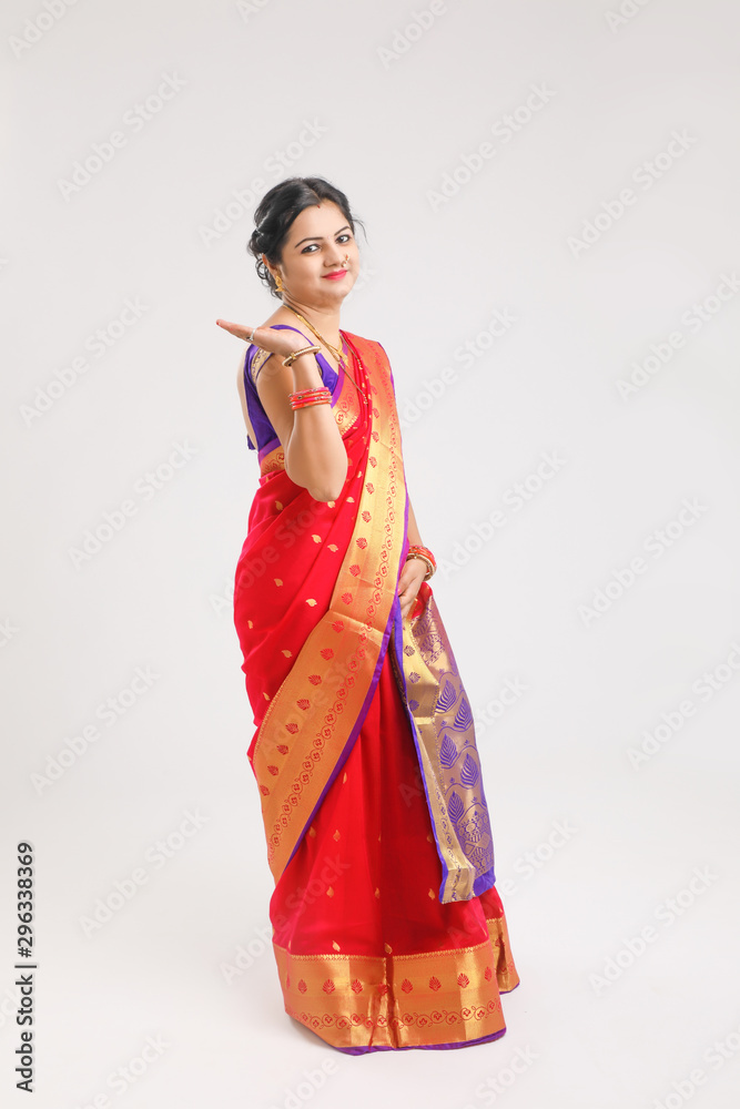 Happy Young indian woman wearing sari and Smiling Happy Young indian woman wearing sari and Smiling