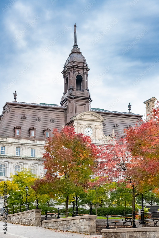 Montreal, the town hall in the center, beautiful building in autumn, with colorful trees
