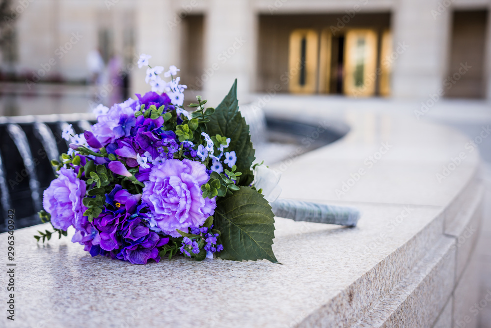 custom made wallpaper toronto digitalBrides bouquet sits by fountain outside church