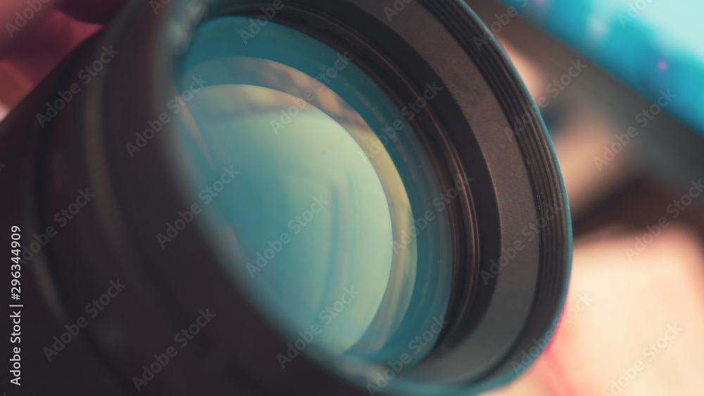 Close up camera lens with light reflection Close up camera lens with light reflection
