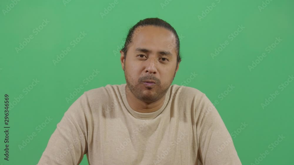 Funny Pose Tongue Farting By A Adult Man. Studio Isolated Shot Against Green Screen Background Funny Pose Tongue Farting By A Adult Man. Studio Isolated Shot Against Green Screen Background