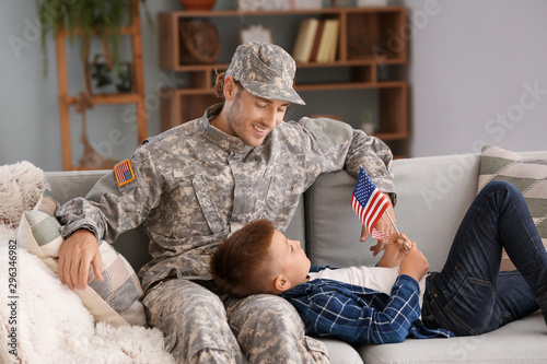Happy military man with his...