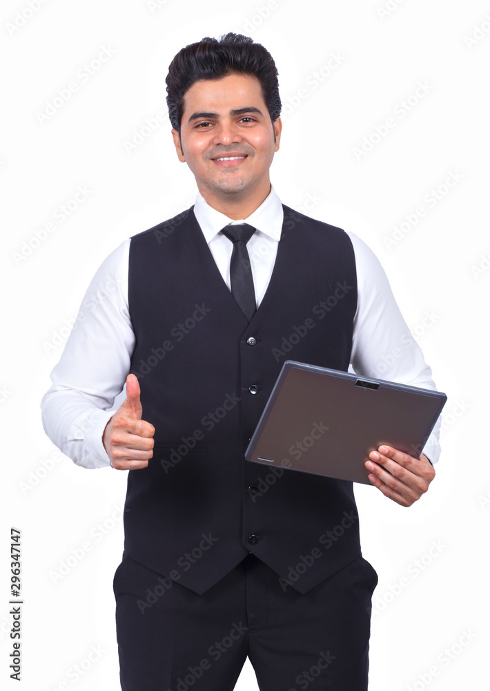 Successful businessman with digital tablet showing thumbs up on white background
