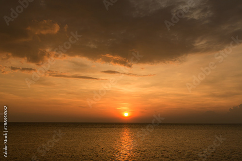 Twilight sky background. Colorful Sunset sky and cloud.vivid sky in twilight time background. Fiery orange sunset sky. Beautiful © kanpisut
