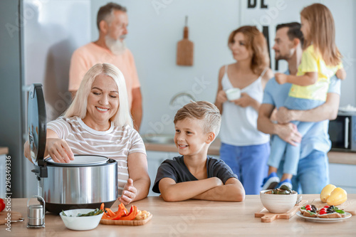 Mature woman with grandson ...