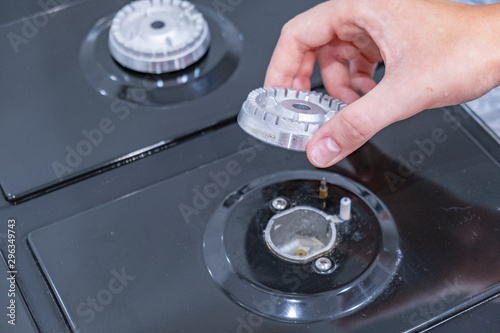 Fragment of a gas kitchen stove. Fragment of a gas kitchen stove. Clean gas stove closeup