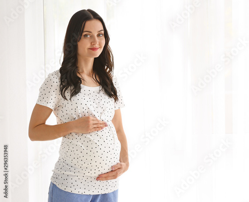 Beautiful young pregnant wo...