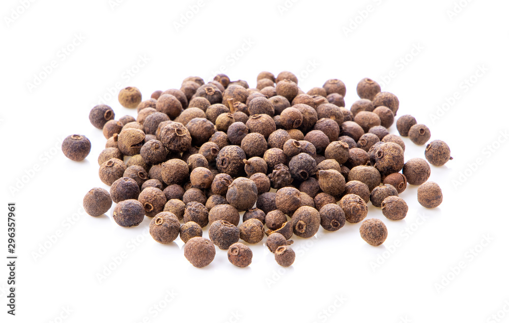 Allspice berries (also called Jamaican pepper or newspice) over white background. - obrazy, fototapety, plakaty 