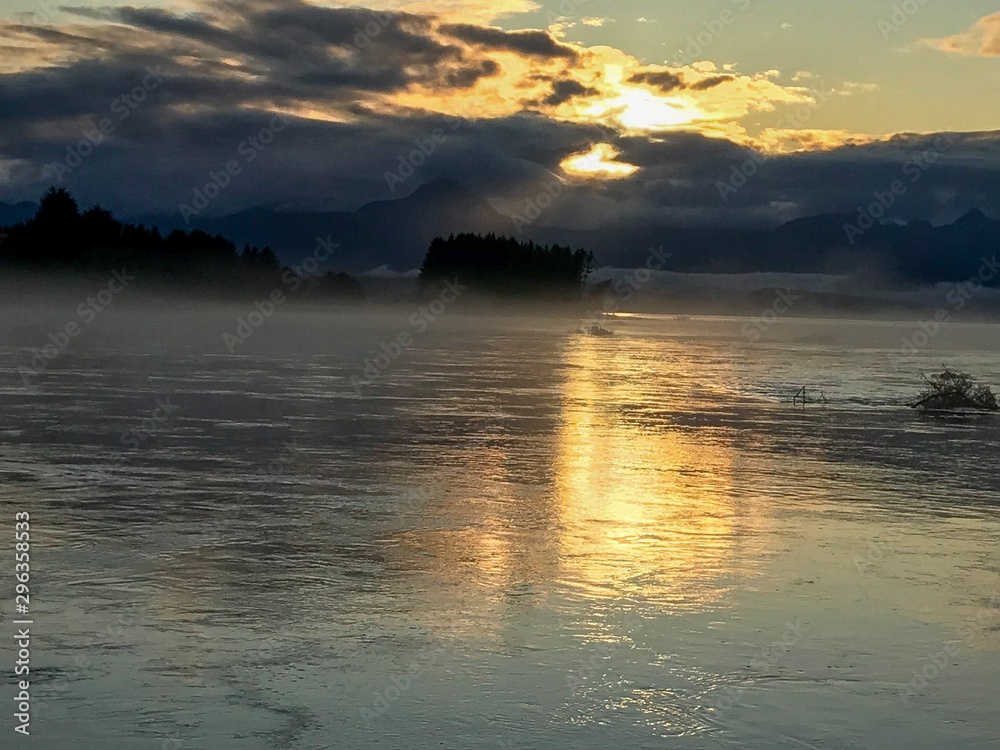 Obraz premium sunset over lake River , Alaska 