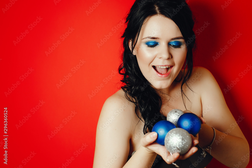 beautiful young and fashion girl with blue christmas toy beautiful young and fashion girl with blue christmas toy