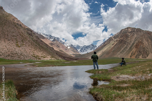 Couple fishing in the Andes mountains