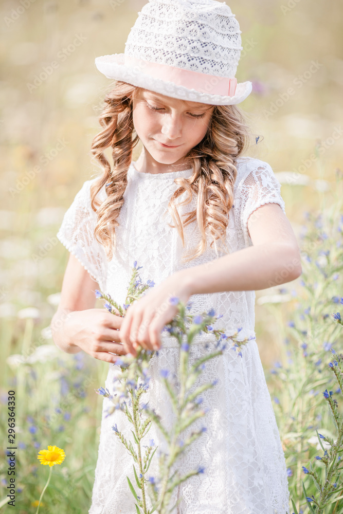 Girl in a flower meadow
