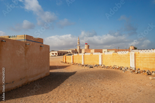 Sultanate Of Oman, Ras al Hadd, Ras al Hadd Castle with Omani flag and minaret