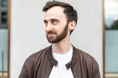 Portrait of a bearded man in the city