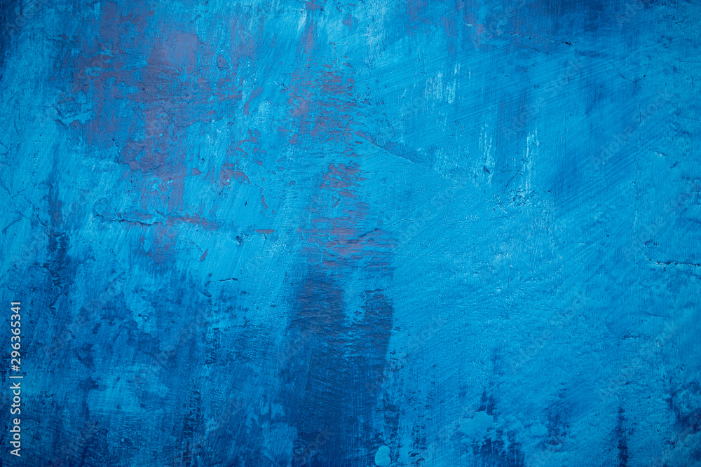 Beautiful blue painted grunge wall texture, different blue tones, blue backgraund.
