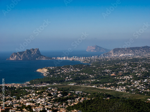Panoramic aerial view of Mediterranean Bay with the Peñon de Ifach in the background