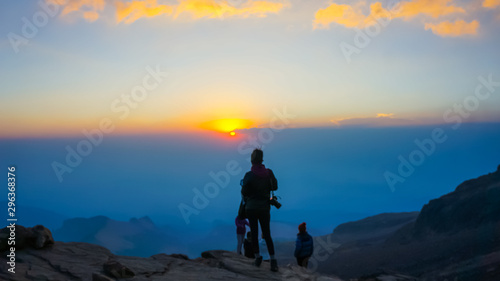 silhouette of man on top of mountain © Jairo