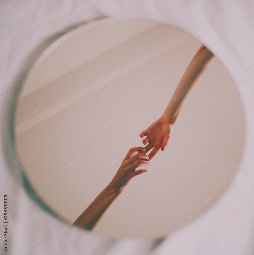 Reflection of hands in mirror Stock Photo Adobe Stock