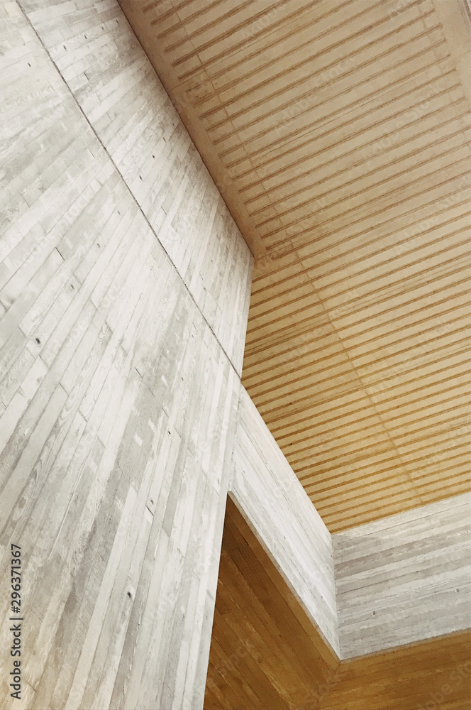 Low angle view of concrete wall and ceiling of building Low angle view of concrete wall and ceiling of building