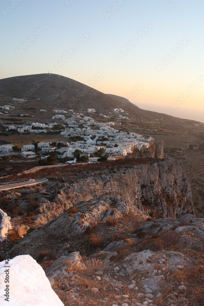 Folegandros island in the Aegean at sunset: landscape and architecture