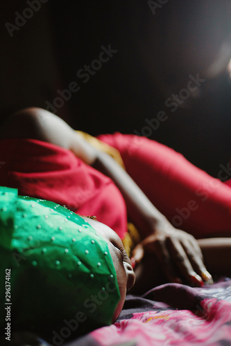 Eye level view of woman resting in sunlight photo