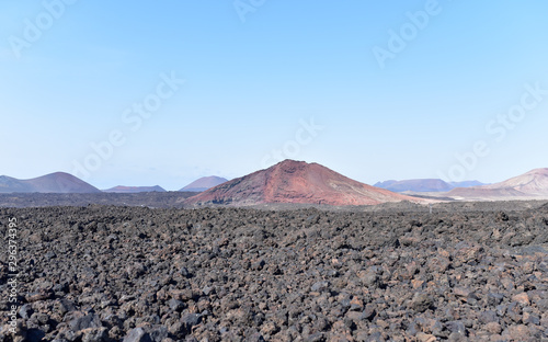 Montana del Cuervo in Timanfaya National Park, Fire Mountains in the distance, Lanzarote, Canary Islands, Spain