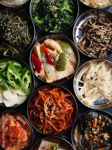 Variety of Asian food in bowls, overhead view