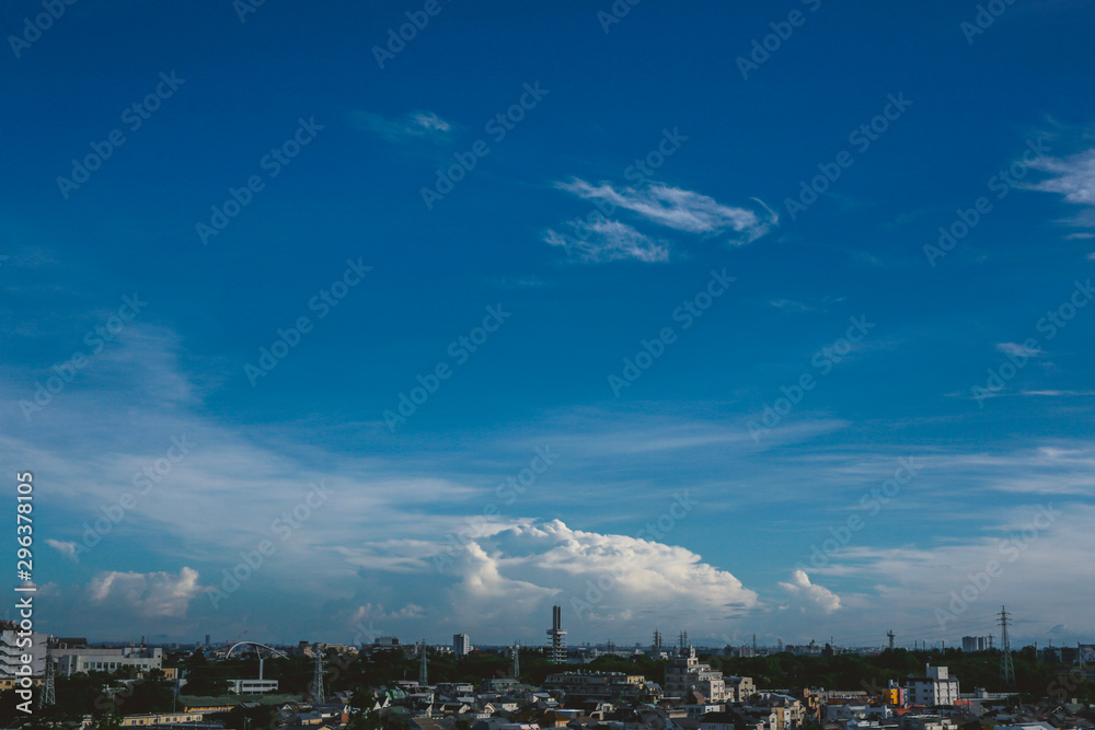 View of cityscape against cloudy sky View of cityscape against cloudy sky