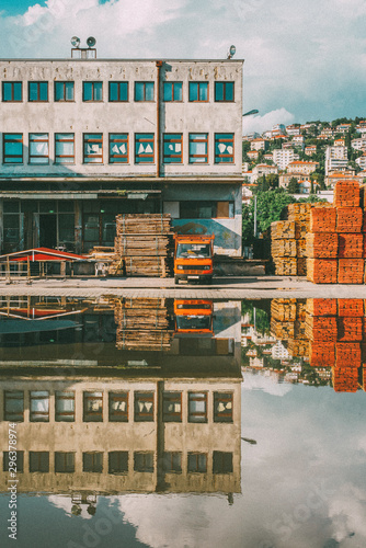 View of warehouse by lake