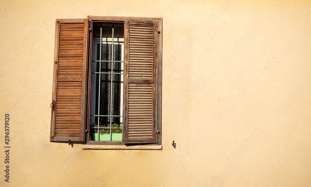 Old window with shutters