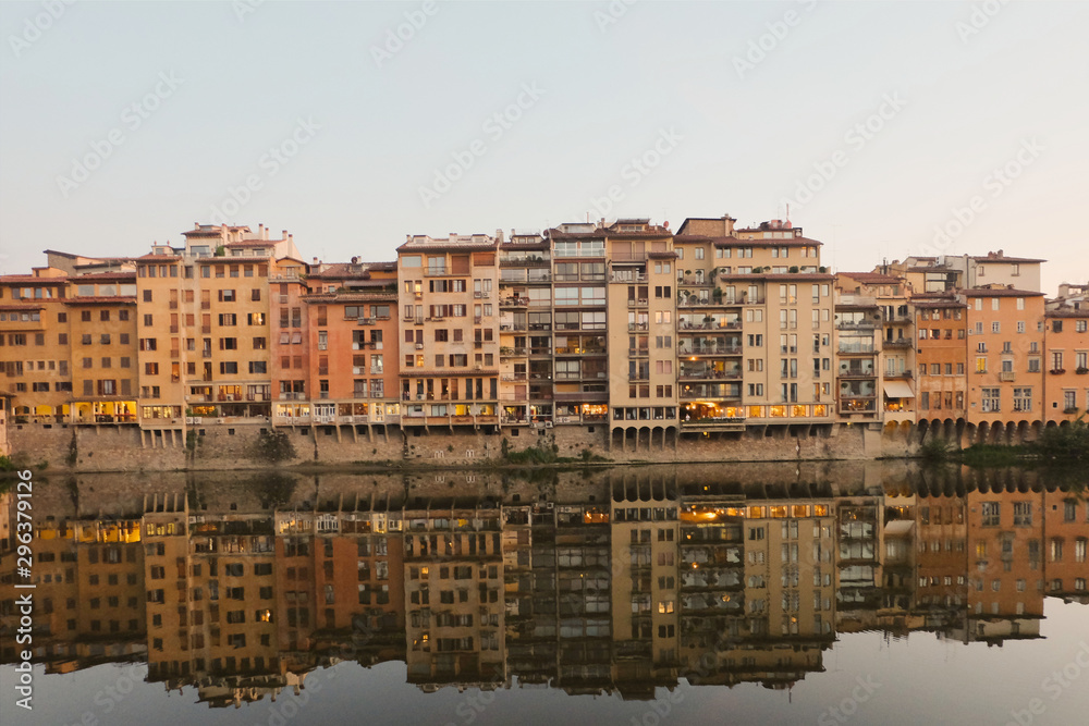 Front angle view of building with reflection in water Front angle view of building with reflection in water