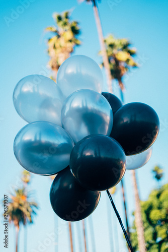 Bunch of balloons against sky
