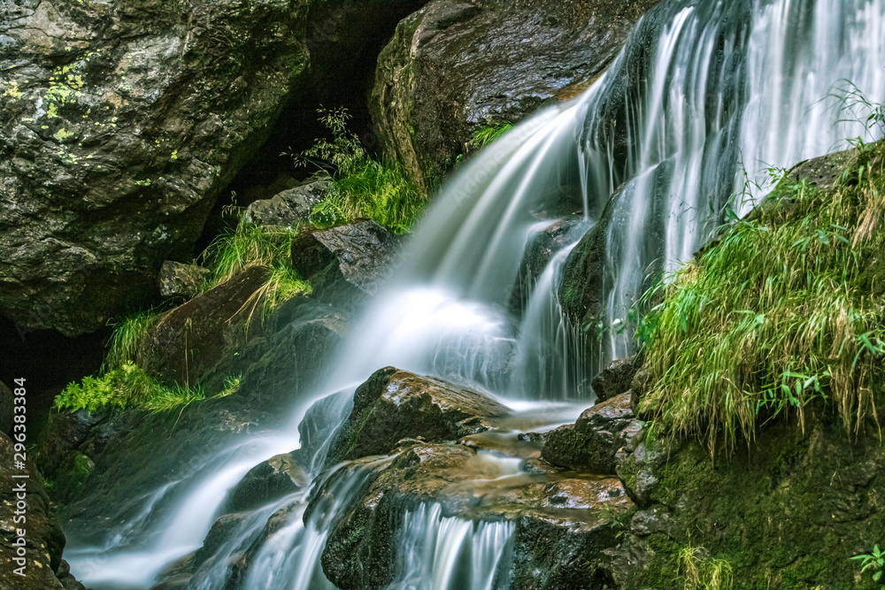 Fototapeta premium The famous Risslochfälle with silky water effect near Bodenmais, Bavarian forest, Bavaria, Germany