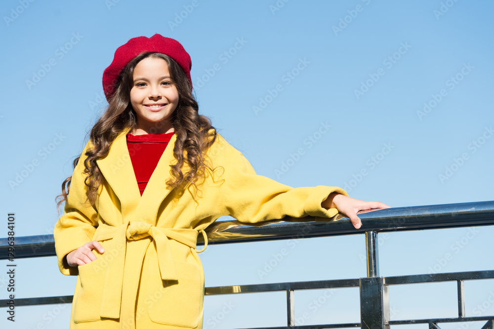 Farewell to autumn. Last autumn beams. Ideas for autumn leisure. Childhood is about happy memories. Smiling little kid in hat sky background. Small girl wear fall outfit outdoors. Autumn bucket list