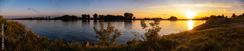 Beautiful sunset with reflections in the river danube near Metten, Bavaria, Germany