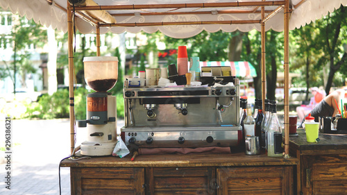 Mobile coffee counter with coffee machine in park