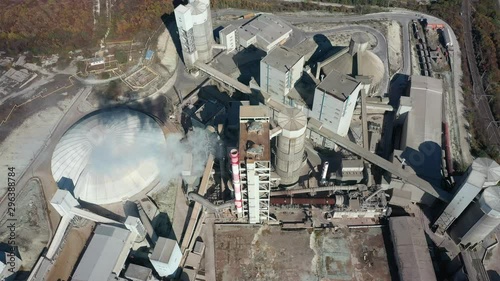 Aerial view of industrial concrete manufacturing plant in countryside, top view