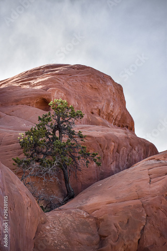 View of rock formation against cloudy sky