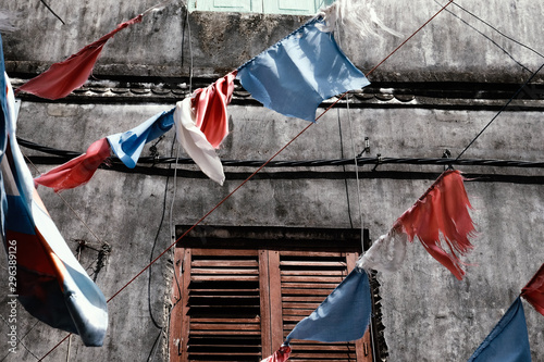 Buntings hanging against old building