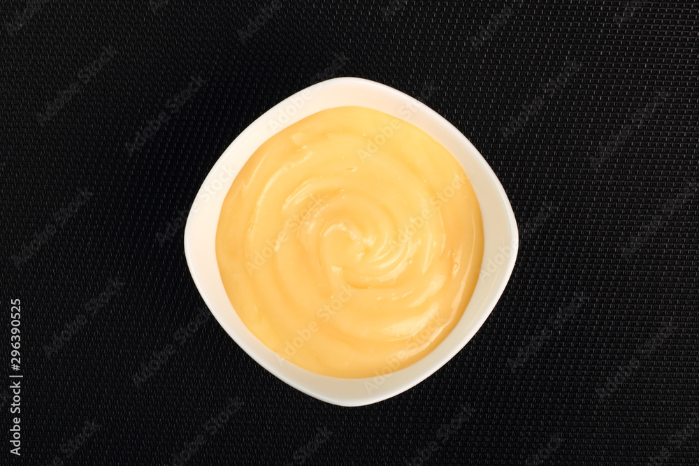Mayonnaise in bowl. Directly Above. Mayonnaise in bowl. Directly Above.