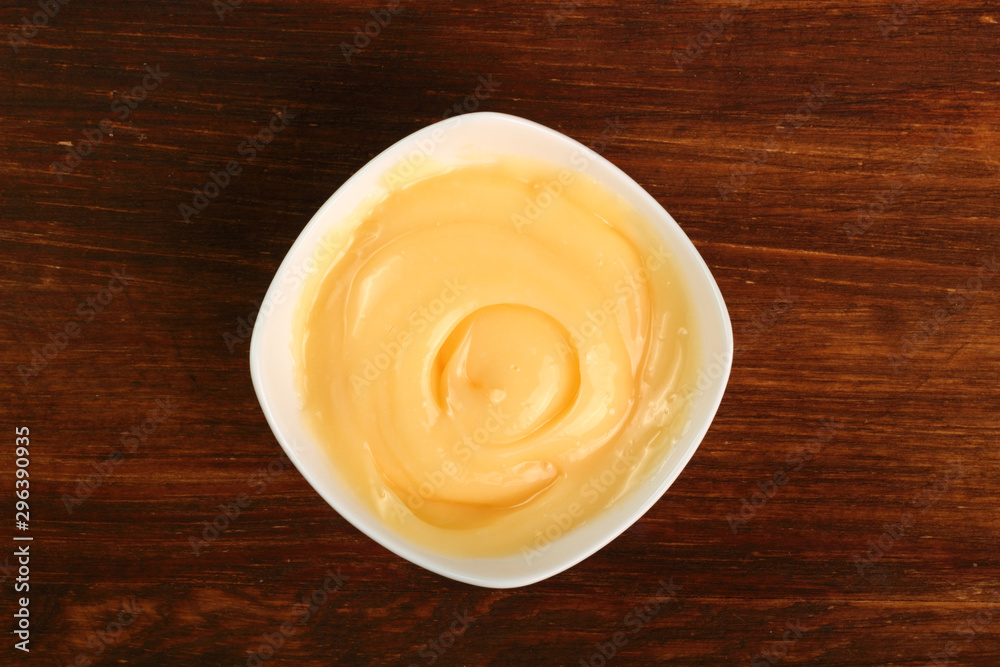 Mayonnaise in bowl. Directly Above. Mayonnaise in bowl. Directly Above.