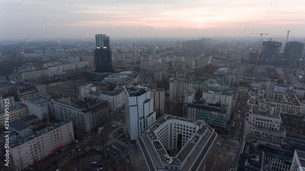 Warsaw Poland. 04. December. 2018.  Panoramic aerial visas on modern skyscrapers and buildings at dusk.