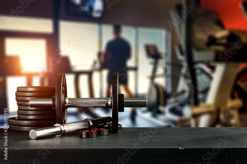 Dumbbells in gym interior and free space for your decoration. 