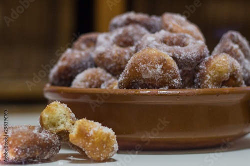 Plate of homemade donuts with sugar. Typical Spanish dessert. Food concept
