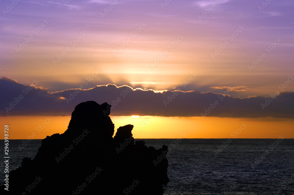 Lava Sea Stacks Silhouetted by Sunrise