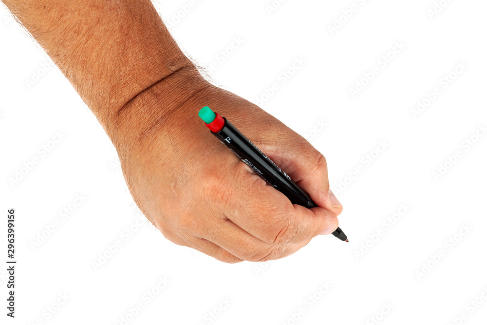 Hand writes with a felt-tip pen on a white background. Top view, isolate. Hand writes with a felt-tip pen on a white background. Top view, isolate.