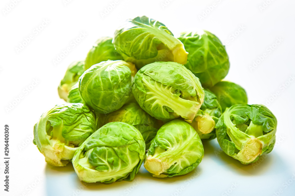 Brussels sprouts 500 grams lies on a white background. Not isolated. Brussels sprouts 500 grams lies on a white background. Not isolated.