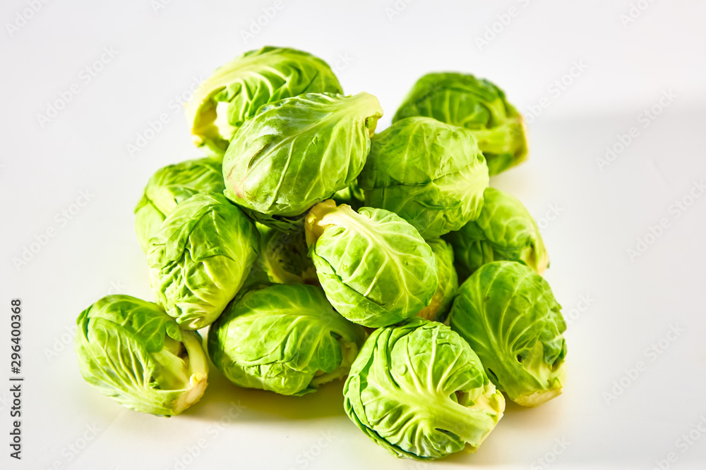 Brussels sprouts 500 grams lies on a white background. Not isolated. Brussels sprouts 500 grams lies on a white background. Not isolated.