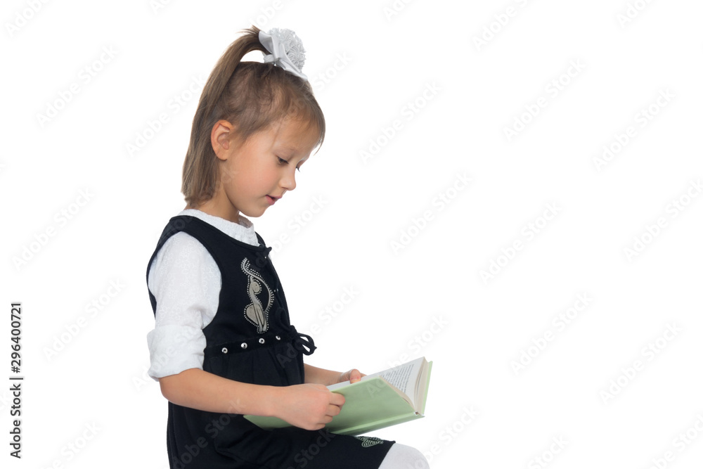 Little girl with a book.Isolated over white background Little girl with a book.Isolated over white background